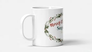 Personalized Christmas mug with evergreen wreath design and custom name for holiday gifting